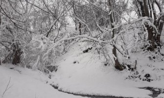 Promljenljivo oblačno, slab snijeg na sjeveru